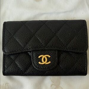 CHANEL Black Quilted Wallet with Gold Logo